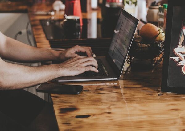 Man typing on Computer